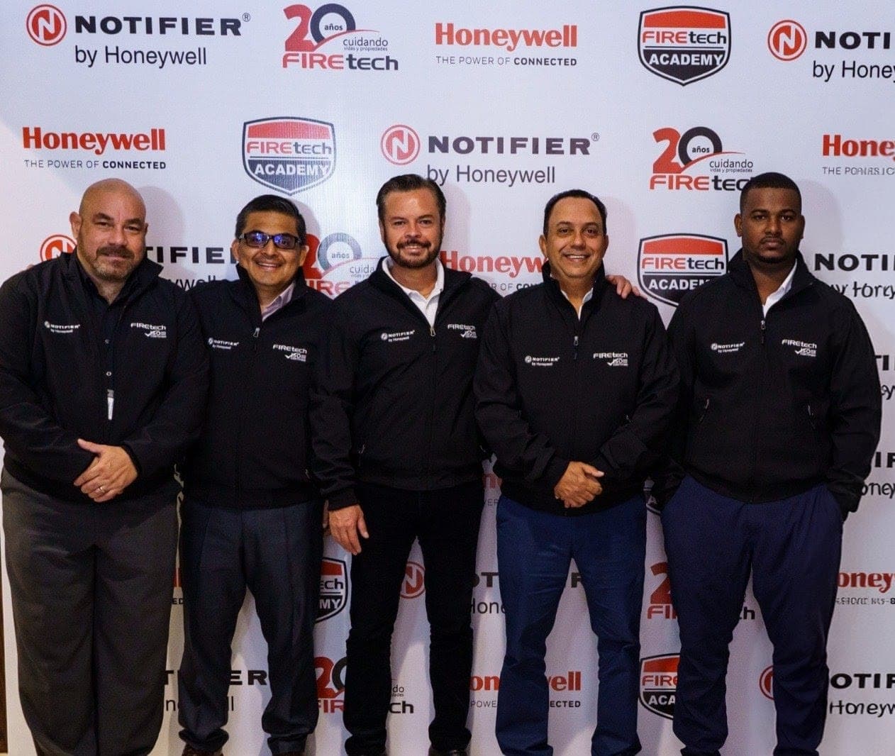 Firetech Academy instructor team in branded jackets at Honeywell Notifier event