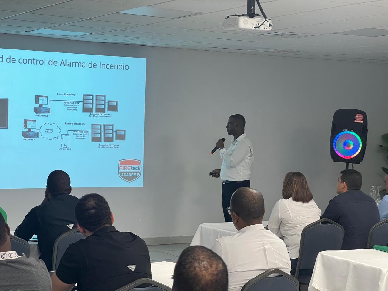 Firetech Academy fire alarm monitoring class with instructor and attendees